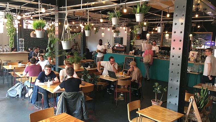 Visit acclaimed coffee house Flat Caps for a great brew and a warm vibe