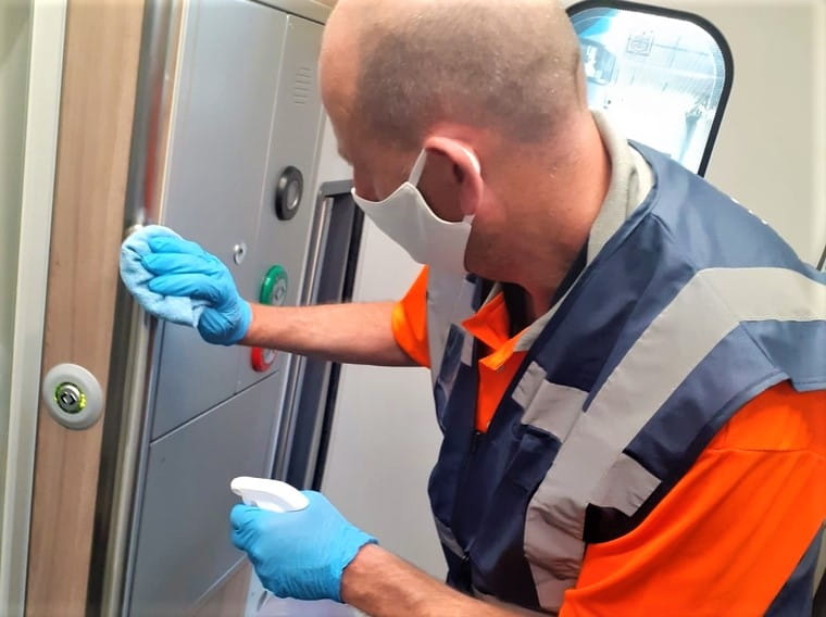 TransPennine Express employee cleaning the train