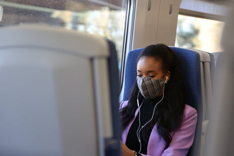 Woman wearing face mask on TransPennine Express train