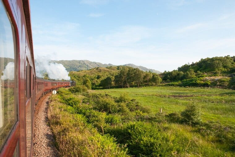 Steam train going through the Scottish highlands