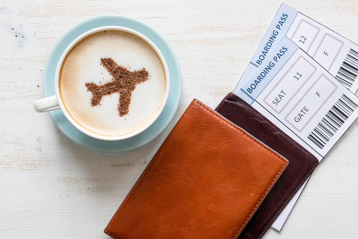 Boarding passes and coffee at the airport