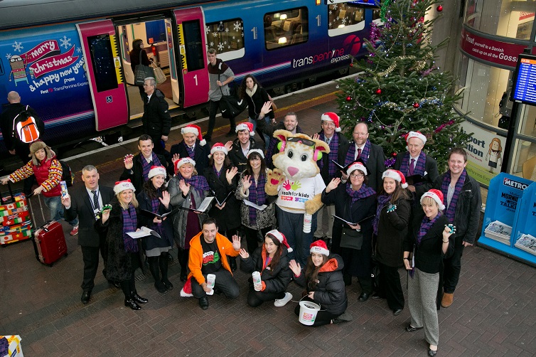 Christmas choir on station platform